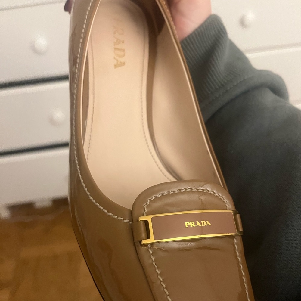 Elegant Prada Pumps with gold detailing